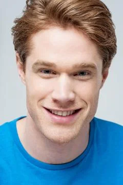 Portrait of a smiling guy Stock Photos