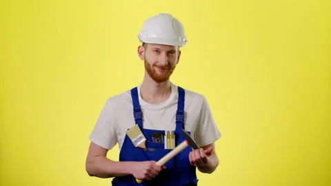 Portrait Of Smiling Male Builder, Engineer In Hardhat Wear Blue Uniform Stock Footage 170187275