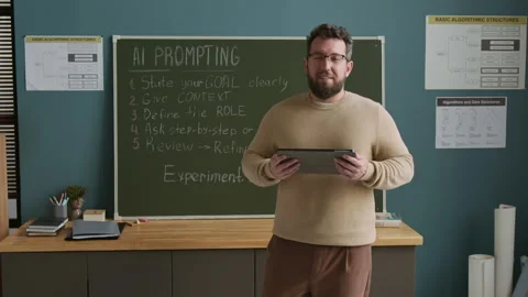 Portrait of Smiling Male Coding Teacher during Artificial Intelligence Lesson Stock Footage 318721064