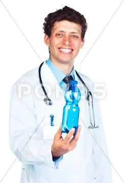 Portrait of a smiling male doctor holding bottle of water on white Stock Photos