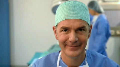 Portrait of A Smiling Male Surgeon Stock Footage