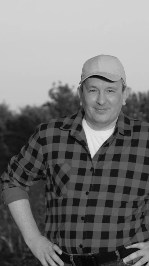 Portrait smiling man farmer posing at sunset sunny corn field countryside nature Stock Footage 279899715