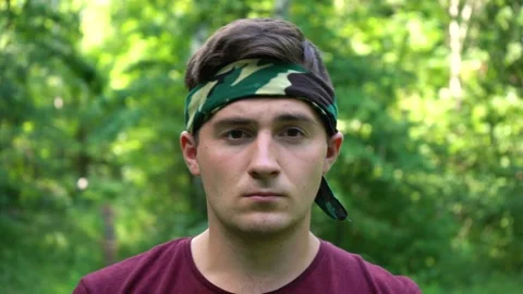 Portrait of a smiling man in the forest Stock Footage 155489217