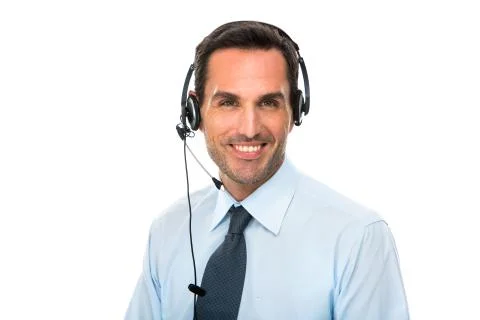 Portrait of a smiling man with headset working as a call center operator Stock Photos