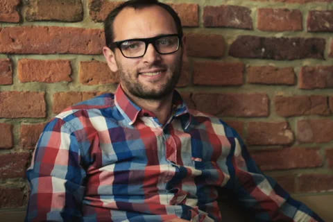 Portrait of smiling man with laptop computer Stock Footage 33824425