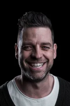 Portrait of a smiling man looking at the camera. Stock Photos