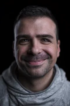 Portrait of a smiling man looking at the camera Stock Photos