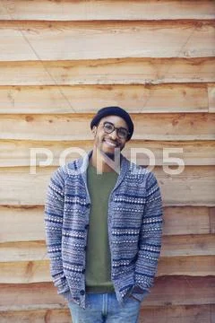 Portrait smiling man outside cabin Stock Photos