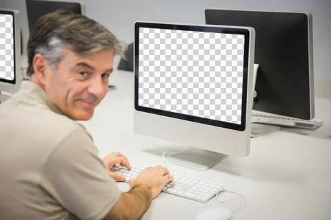Portrait of smiling man using computer Stockfoto's