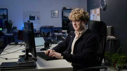 Portrait of Smiling Man Working at Computer in Tech Office Stock Footage 347286193