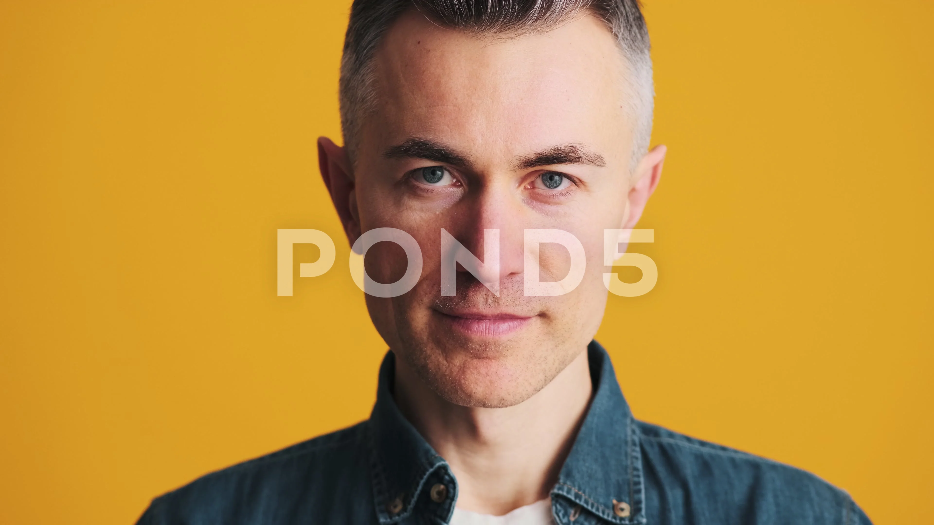 The portrait of a smiling mature man loo... | Stock Video | Pond5