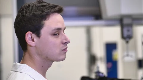 Portrait of Smiling Professional Engineer Controls Modern 3D Measuring Machine 動画素材 124580862