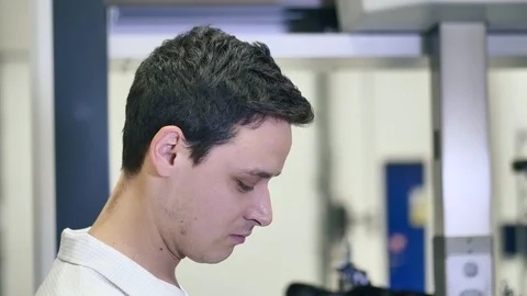 Portrait of Smiling Professional Quality Engineer Modern 3D Measuring Machine 動画素材 127029607