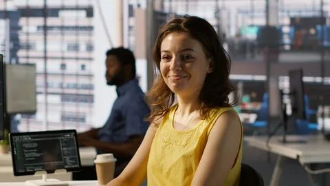 Portrait of smiling programmer creating machine learning models Stock Photos