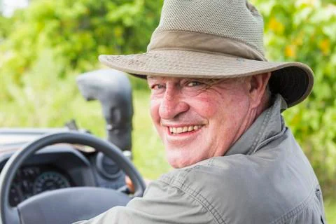Portrait of smiling safari guide in a bush hat Stock Photos