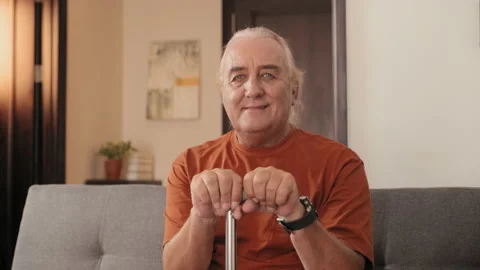 Portrait of Smiling Senior Man with Cane at Home Stock Footage 239352300