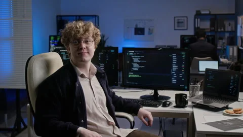 Portrait of Smiling Software Developer Working in Modern Office 動画素材 347297694