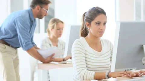 Portrait of smiling student in computing class Stock Footage 56324566