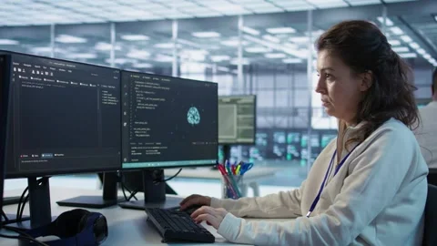 Portrait of smiling technician programming in AI data center Stock Footage 319247444
