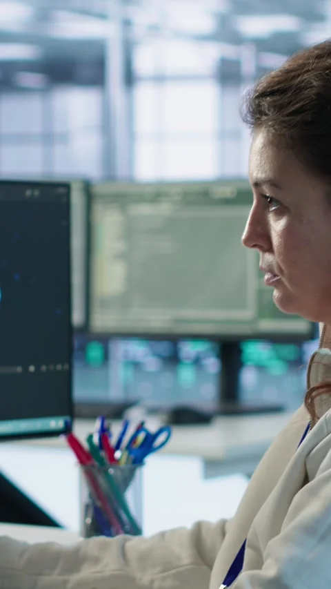 Portrait of smiling technician programming in AI data center Stock Footage 319526398
