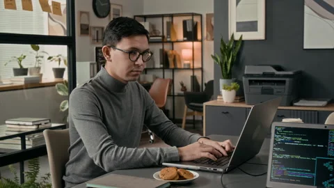 Portrait of Smiling Web Developer Programming on Laptop in Office of IT Company Video stock 329611998