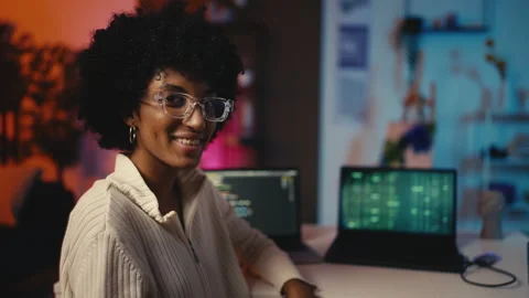 Portrait of smiling woman programmer coding on laptop, creative technology job Stock Footage 303697520
