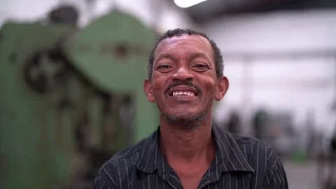 Portrait of Smiling Worker Stock Footage 84790260