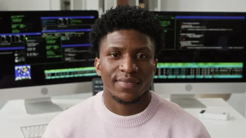 Portrait of Smiling Young Black IT Developer Standing in IT Office Video stock 330133251