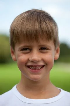 Portrait of a smiling young boy Stock Photos