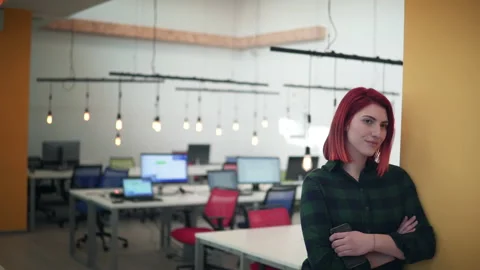 Portrait of smiling young female developer as a successful independent busine Stock Footage 154772123