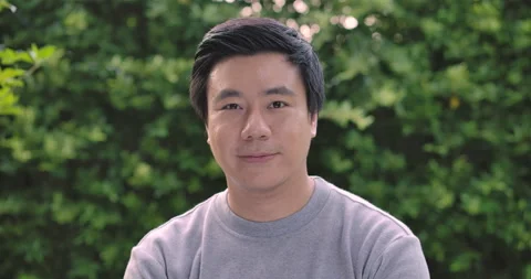 Portrait of a smiling young man looking at camera. Stock Footage 130605839