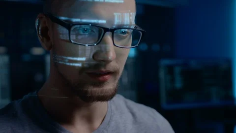 Portrait of Software Developer / Hacker wearing Glasses Working on Computer, Pro Stock Footage 103575345