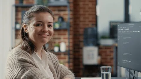 Portrait of software developer typing programming language on computer keyboard Stockfoto's