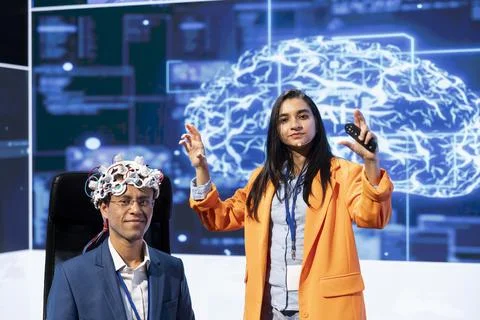 Portrait of specialist speaking at tech event, presenting neural implants Stock Photos