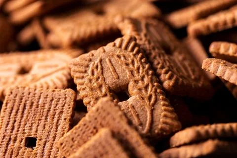 A portrait of a stack of brown cookies called speculaas or speculoos in Bel.. Stock Photos