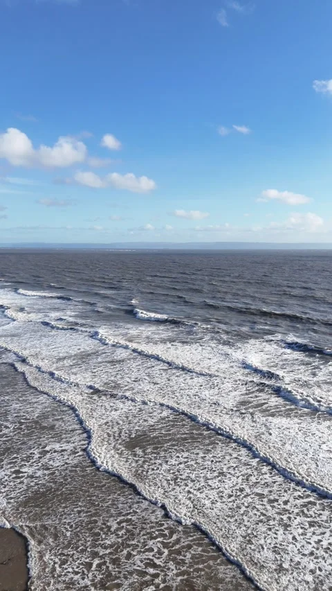 Portrait Static Drone View of Long Ocean Waves and Surf 4K Stock-Footage 334068643