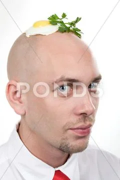 Portrait of strange man with fried egg on top of bald head Stock Photos
