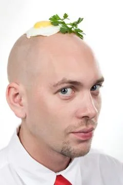 Portrait of strange man with fried egg on top of bald head Stock Photos