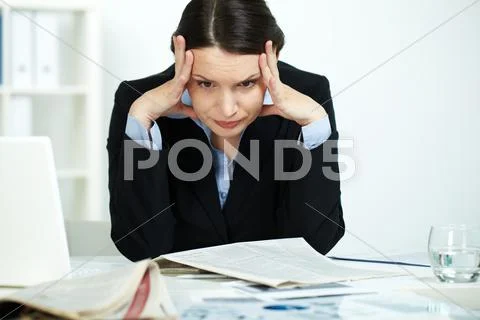 Portrait of stressed office worker in trouble Stock Photos
