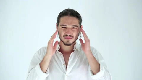 Portrait of stressed young man having terrible strong headache. Stock Footage 135604775