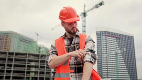 Portrait of strong builder outside, construction site Stock Footage 274397799