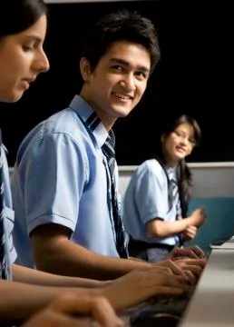 Portrait of a student in a computer lab Stock Photos
