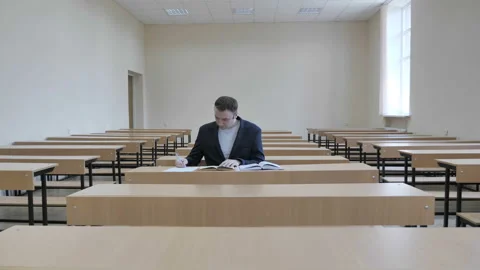 Portrait Of Student Working In Classroom Stock Footage 134947907
