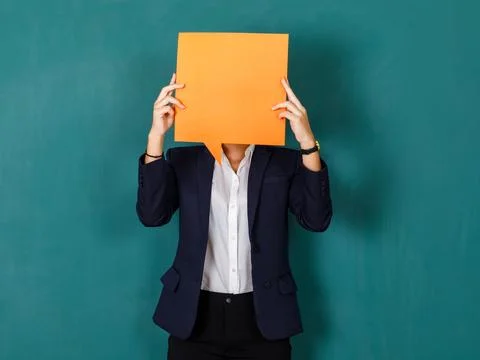Portrait studio shot of unrecognizable unknown professional female teacher .. Stock Photos