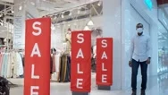 A Portrait Of A Stylish Black African Man Walking Through A Mall Wearing A Face Stock Footage