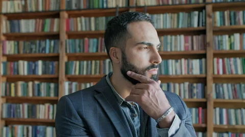 Portrait Of Stylish Young Man In The Library. Stock Footage 140220915