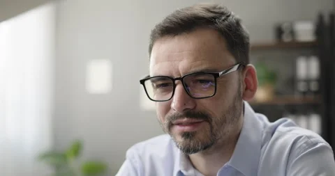 Portrait of successful entrepreneur working using laptop computer, analyzing Stock Footage 275619324