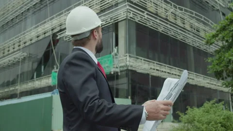 Portrait successful handsome engineer, architect, builder, businessman in white Stock Footage 238027006