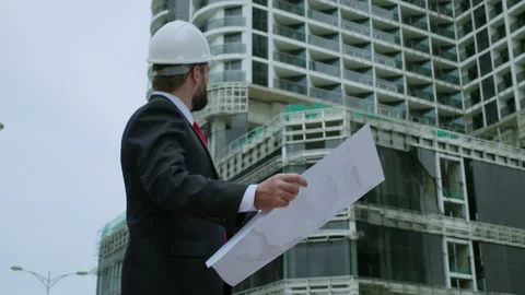 Portrait of a successful handsome engineer of bearded, senior architect, builder Stock Footage 219508002