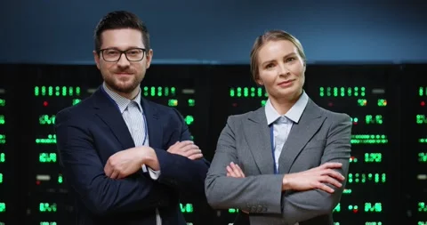 Portrait of successful programmers teammates, man with glasses and blond woman Video stock 152056318